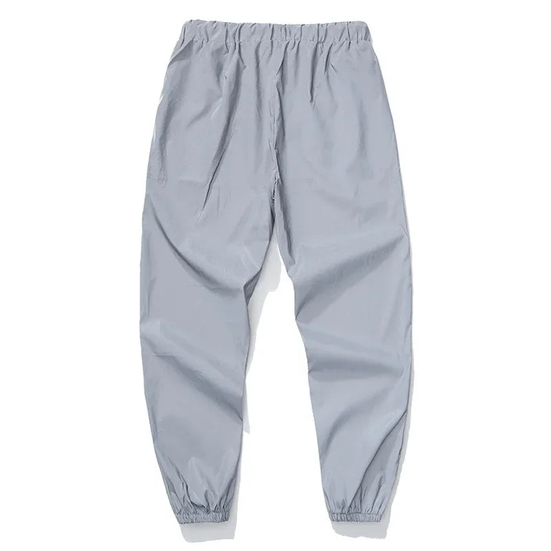 LUMEN Reflective Track Pants